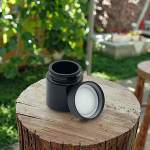 Pot en verre opale noir résistant aux enfants Cannacoast personnalisé de 2 oz, 3 oz, 4 oz pour l'emballage de bourgeons de fleurs séchées - Product Image 1