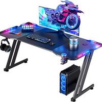 Escritorio Gamer Ergonómico RGB LED al por Mayor con Portavasos, Estructura Robusta en Forma de Z, Mesa de Computadora de Metal, Superficie de Fibra de Carbono, Estilo Moderno para Estudio