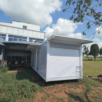 Garage modulaire de 20 pieds - Abri de voiture moderne en acier avec construction en panneaux sandwich