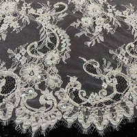 Tissu en dentelle Chantilly française de luxe, lourdement perlé, brodé de perles et de paillettes
