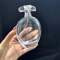 Flacon de parfum ovale haut de gamme personnalisé de 30 ml, 50 ml, 70 ml, 150 ml avec tête de pompe et boîte cadeau personnalisée