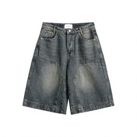 Shorts en jean délavé pour homme avec patchwork et surpiqûres lumineuses, coupe ample et droite à jambe large, effet vieilli