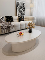 Table basse de salon de style français pour usage domestique, en quartzite couleur crème, design inspiré des designers, minimaliste et moderne, forgée