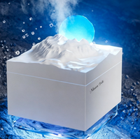 Humidificateur de bureau et veilleuse d'ambiance style Nouvelle Lune, compatible avec les huiles essentielles d'aromathérapie