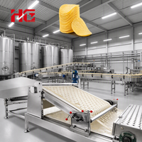 Chaîne de production de chips de pommes de terre entièrement automatique HG 380V, 250kg/h, en acier inoxydable 304, avec friteuse et stérilisateur alimentaire automatique