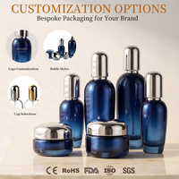 Bouteilles de crème pour le visage en verre bleu foncé, flacons pompe à lotion avec bouchon argenté, pour emballages cosmétiques et soins de la peau, directement de l'usine.