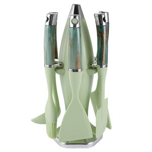 Ensemble d'ustensiles de cuisine en silicone à 7 pièces avec manches en marbre et grain de bois, et support de rangement en plastique en forme de fusée - Product Image 1