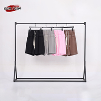 Shorts vintage pour homme 320g avec double ceinture, finition effet neige délavée, design inspiré de la côte ouest