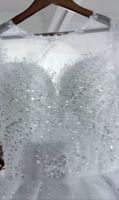 Robe de mariée de luxe 2026 entièrement ornée de cristaux, style robe de bal, manches longues transparentes, col rond illusion, grande taille, style africain, Vestido De Novia