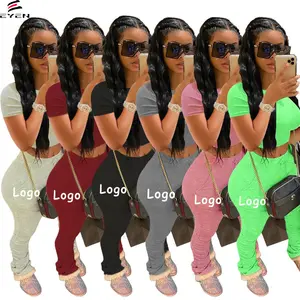 Conyson diskon besar celana Legging Crop Top seksi Skinny Solid lengan pendek katun musim panas Logo kustom set pakaian wanita 2 potong