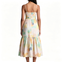 Robe longue multicolore tie-dye pour femme, bretelles spaghetti, buste froncé, jupe à volants, élégante et fluide, idéale pour l'été, la plage ou les invitées de mariage