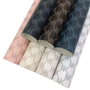 Material de tela de piel sintética de vinilo en relieve texturizado de color impreso con letras para zapatos/bolso/lazo para el pelo/fabricación artesanal