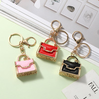 Pendentif de sac en métal de style raffiné européen et américain, accessoires de luxe légers pour voiture et porte-clés, vente en gros