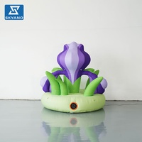 Modèle de fleurs gonflables irrégulières violettes personnalisées pour la décoration d'événements publicitaires en plein air, dans les parcs et sur les scènes