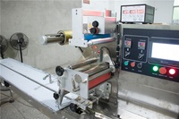 Machine manuelle semi-automatique d'emballage d'oreillers machine d'emballage de bonbons arachides bar sucre cubes flux