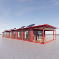 Kit de maison préfabriquée en conteneur à deux chambres, design moderne, panneaux sandwich en acier, certifié ISO9001, pour bureau, cuisine ou usage commercial.