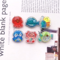 Breloques en résine à paillettes représentant des créatures marines (poulpe, poisson, dauphin) pour la création de pendentifs, colliers et coques de téléphone faits main
