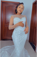 Robe de mariée sirène à col rond illusion, manches longues, corsage en satin plissé, ornée de perles scintillantes, pour mariées africaines