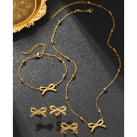 Parures de bijoux en acier inoxydable, design exquis avec nœud, collier, bracelet, bague, boucles d'oreilles, parures de bijoux pour femmes, bijoux tendance, lot de 4