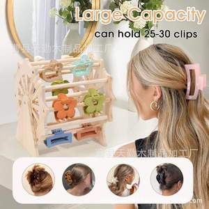 Creative wooden display rack with claw clips and hair accessories, 360-degree rotating Ferris wheel design. - Product Image 4