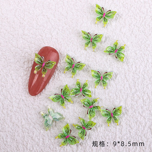 Nouveauté : 50 pièces/sac, breloques 3D papillon pour nail art, papillons colorés lumineux pour nail art - Product Image 6