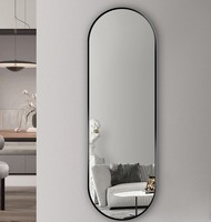 Miroir mural ovale pleine longueur Wosen, cadre en métal noir fin, forme capsule, du sol au plafond, pour salon, entrée, décoration personnalisée