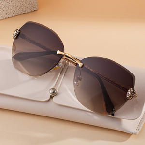 Lunettes de soleil sans monture Tory Burch Cat Eye pour femmes, design tête de serpent noir et or, verres PC UV400, monture en alliage de zinc - Product Image 3