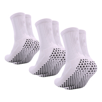 Vente en gros Chaussettes de sport de football unisexes noires écologiques en bambou à haute compression et antidérapantes avec logo antidérapant pour hommes