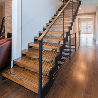 Escalier intérieur à poutres en acier en zigzag, design d'escalier droit contemporain