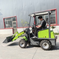 Mini-chargeuse compacte sur pneus, petite chargeuse frontale avec godet pour la construction, l'agriculture et l'aménagement paysager
