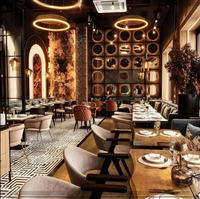 Ensemble de chaises de salle à manger de restaurant en cuir PU de luxe moderne et durable avec plateau en faux marbre et structure en métal