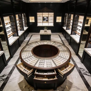 Ensemble d'agencements de magasin d'optique de luxe personnalisable avec éclairage LED en verre trempé, design durable - Meubles muraux ronds pour îlot central - Product Image 4
