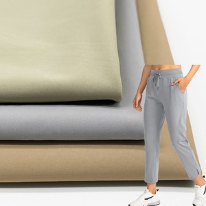 Không có moq đàn hồi mềm cảm giác mát mẻ mịn nhanh chóng khô Polyamide Nylon Spandex dệt kim vải theo dõi quần Activewear vải - Product Image 1
