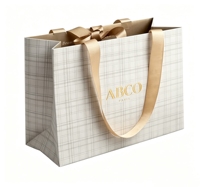 Sac de shopping en papier de luxe recyclable imprimé sur mesure à bas prix avec poignée en ruban et votre propre logo