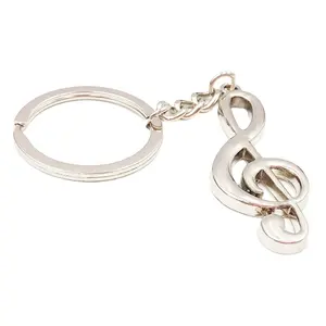 Creativo música metal símbolo llavero música regalos treble clef de la nota musical llavero