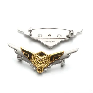 Wholesale china manufactures custom logo wing badge with safety pin accessory