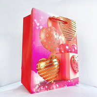 Glanzend roze gouden hartvormige papieren cadeauzakjes, diverse maten, met koordhandvatten voor Valentijnsdag, bruiloft, verjaardag, feestdagen en cadeauverpakkingen.