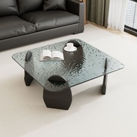 Table basse de style italien, luxe léger, motif ondulé, plateau en verre trempé, design carré, salon, minimaliste, petit appartement