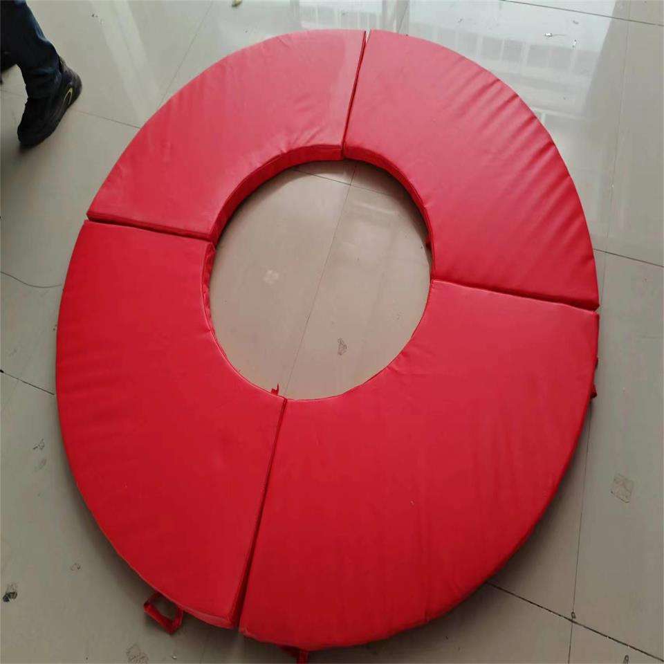 red round trampoline pad