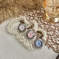 Montre à bracelet élastique avec pointeur de mode, montre à quartz en acier inoxydable avec verre, bracelet de montre en perles pour femmes