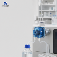 Pompe péristaltique micro DC avec tête bleue et ports cannelés pour transfert précis de liquides en laboratoire