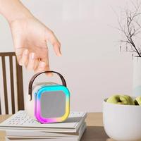 Machine de karaoké portable K12 la plus vendue avec système de haut-parleurs 5.3 Pa 5-10W, microphones sans fil, éclairage LED RGB et carte mémoire