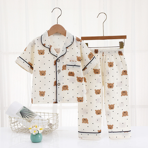 Vente directe usine de pyjamas pour enfants, ensembles en gaze à manches courtes, col à boutonnage simple, imprimé dessin animé, pyjamas pour filles. - Product Image 4