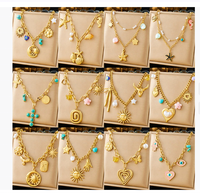 Collier de mode en acier inoxydable avec grand pendentif en forme de cœur, chaîne de pull, papillon en cristal, fleur, multi-éléments
