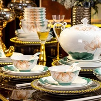 Service de vaisselle en porcelaine haute blanche de Jingdezhen 2026, motif fleur de lotus sous glaçure, compatible micro-ondes, coffret cadeau