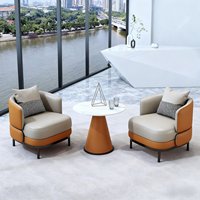 Salon d'accueil professionnel, espace de réunion pour clients, bureau de vente et ensemble table et chaises pour discussions décontractées.