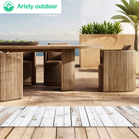 Ensemble de table et chaises de salle à manger d'extérieur en teck moderne pour hôtel, jardin, resort, villa, cour