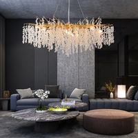 Lustre suspendu LED moderne ovale doré en cristal Hullxine de 63 pouces avec culot E12, intensité variable, pour salle à manger et cuisine