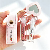 Huile à lèvres repulpante hydratante transparente végane en tube transparent avec miroir, porte-clés et étui en cuir PU pour brillant à lèvres