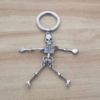 Porte-clés squelette pliable tendance pour hommes et femmes, en argent antique, or, métal, crâne gothique, porte-clés d'Halloween, breloque pour sac